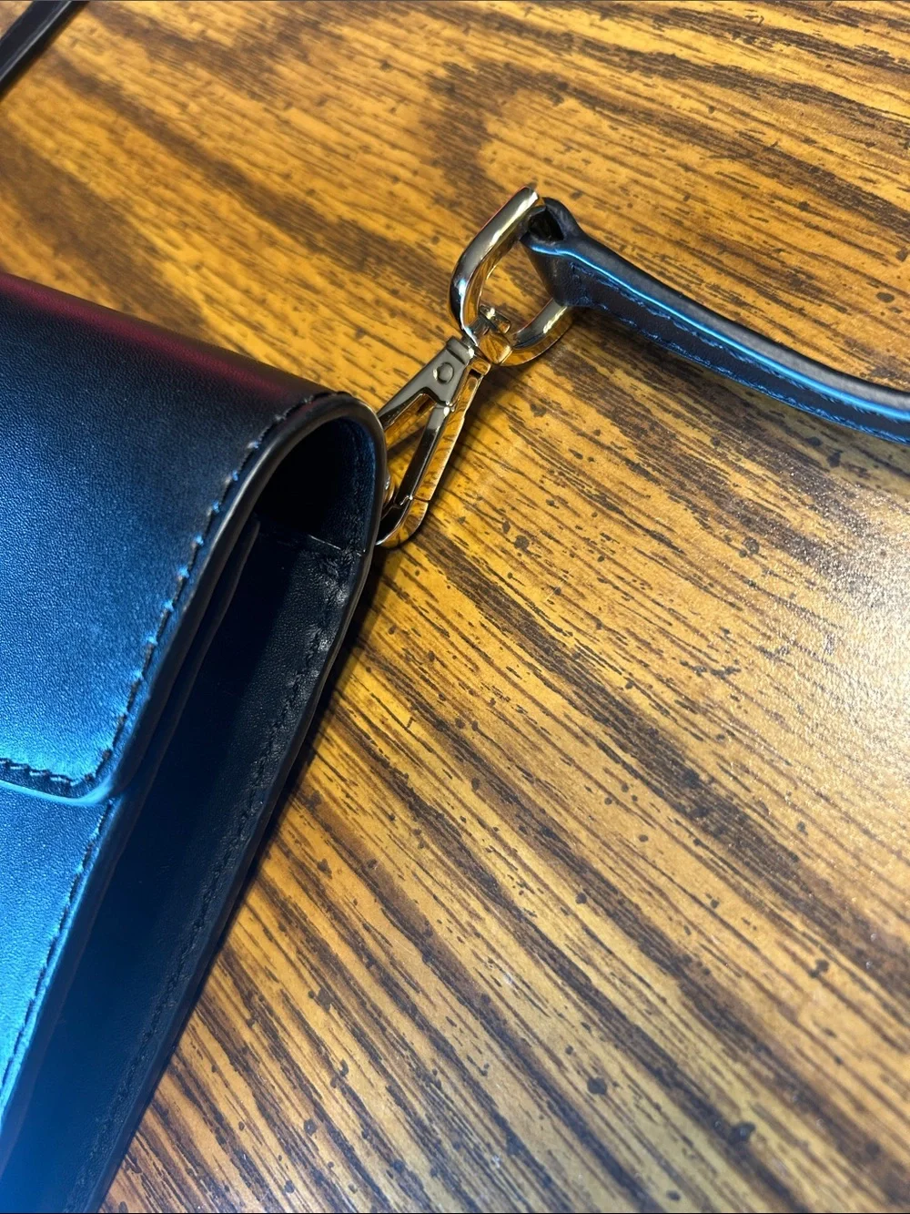Michael Kors Black Leather Envelope Crossbody with Gold Tone Logo